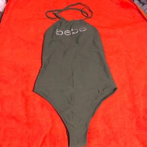 Olive green bebe one piece bathing suit. Size S